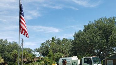 Man watering the lawn Photo